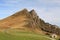 Wonderful view on mountain peak and farmhouse in scenic landscape of beautiful irati mountains in blue sky with overhanging view