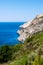 Wonderful view over green bushes, the steep west coast and the blue Mediterranean Sea of Zakynthos
