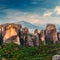 Wonderful view of the rocks and monasteries of Meteora, Greece. Mysterious Sunny Morning with blue sky at sunny day. Awesome