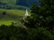 A wonderful view of the top of a church in the woods. Cathedral surrounded by nature