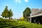 A wonderful vineyard with a wooden lodge during the sunny day