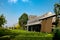 A wonderful vineyard with a wooden lodge during the sunny day