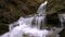 Wonderful waterfall on the mountain river Carpathians.
