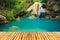 Wonderful waterfall in thailand with bamboo floor