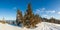 Wonderful wintery Scenery in sunny day. Winter landscape with snow capped mountain under sunlight. Popular hiking and