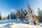 Wonderful wintery Scenery in sunny day. Winter landscape with snow capped mountain under sunlight. Popular hiking and