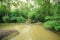 Wonderful wooden bridge across a waterfall, Thailand