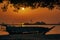 Wonderful yellow sunrise in Dammam Beach with traditional fishing boats