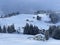 A wonderfully beautiful winter setting with a fresh snow cover in the Swiss Alps and above the Lake Walen or Lake Walenstadt