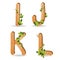 Wood alphabet with branch green leaves