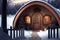 wood arched doorway to house exterior of the winter chalet