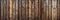 Wood background banner panorama long - Brown wooden acoustic panels wall texture, seamless pattern.