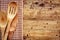 Wood background with kitchen utensils