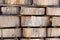 Wood background texture. Cross section of tree trunk. spili trees stumps stacked in stacks. Used for garden doropok, interior and