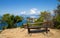 A wood bench on the pathway above the `Baia del Silenzio` Bay of Silence in Sestri Levante, Ligurian coast, Genoa province, Ital