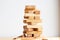 Wood block tower with architecture model, Planning Alternative Risk and Strategy in Business concept