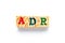 Wood block in word ADR Abbreviation of adverse drug reaction on white background