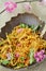 Wood- bowl with special dried chicken and peach flower blooming for lunar new year