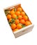 Wood box of valencian oranges on white background
