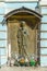 Wood carving entrance door of orthodox Church picturing Mother Mary and Jesus baby