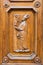Wood carving at a historic door in Florence