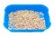 Wood cat litter on a white background. Pets Article about the cat`s toilet and the smell from it. Cat odor neutralizer