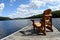 Wood chair on boat deck on the lake