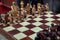 Wood chess pieces on board game