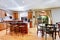 Wood classic large kitchen with granite island.