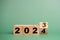 wood cube block 2024 business growth concept. New year business goals, plan and strategy