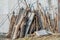 Wood and debris leaning against side of building