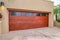 Wood door with glass panes of attached garage in San Diego California house