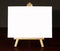 Wood Easel With White Canvas