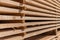 Wood factory stock and lumber board with nature business export. Stack of lumber wood in timber log storage. Wood