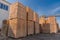 Wood factory stock and lumber board with nature business export. Stack of lumber wood in timber log storage. Wood