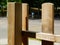 wood fence detail of vertical pine planks with hard wood textured corner post