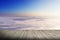 Wood floor against Foggy above the mountain