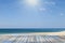 Wood floor with Andaman sea ,beach and tropical sea scenery back