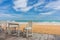 wood floor and seaside table with beach and sea background.