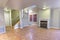 Wood floors, fireplace and colorful walls in spacious empty townhouse