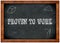Wood frame blackboard with PROVEN TO WORK text written with chalk.