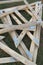 Wood gable triangle roof frame pile on grass