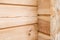 Wood Glued timber close up background. Wooden construction glued laminated timber in the wall of the house. Glued beams. Wooden