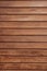 Wood grain texture background with knots and strong lines