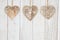 Wood hearts on weathered whitewash textured wood background