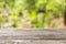 Wood hunter table with forest blur background