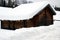 Wood old lodge, landscape, winter in Dolomiti mountains, in Cadore, Italy