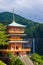 wood pagoda in front of nachi falls