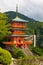 wood pagoda in front of nachi falls