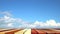 Wood pieces floor and clear blue sky white cloud moving time lapse